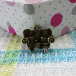 Bronze couch charm