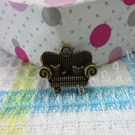 Bronze couch charm