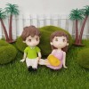 Girl and Boy Sitting