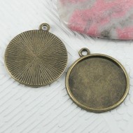 Antiqued bronze color round shaped cabochon settings